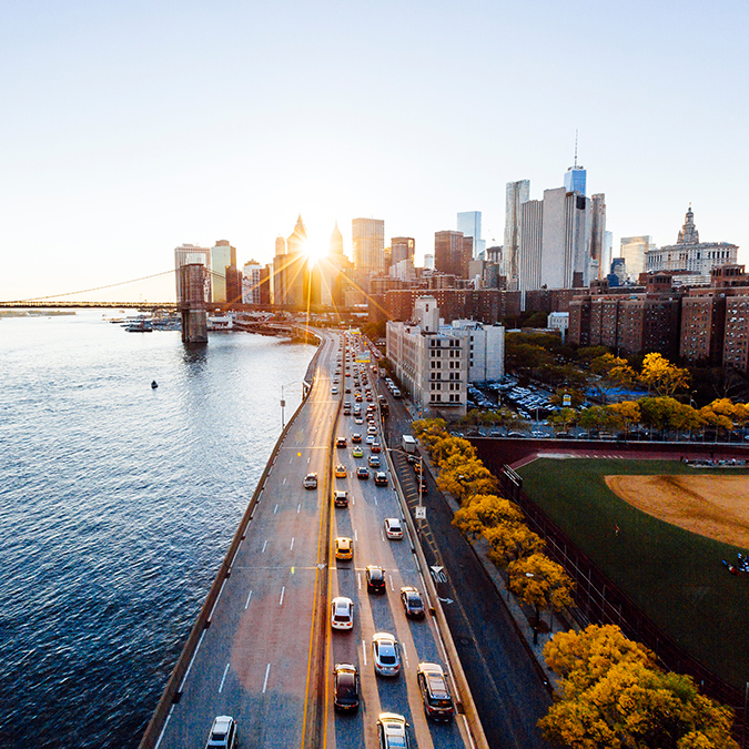 cityscape sunset over river 